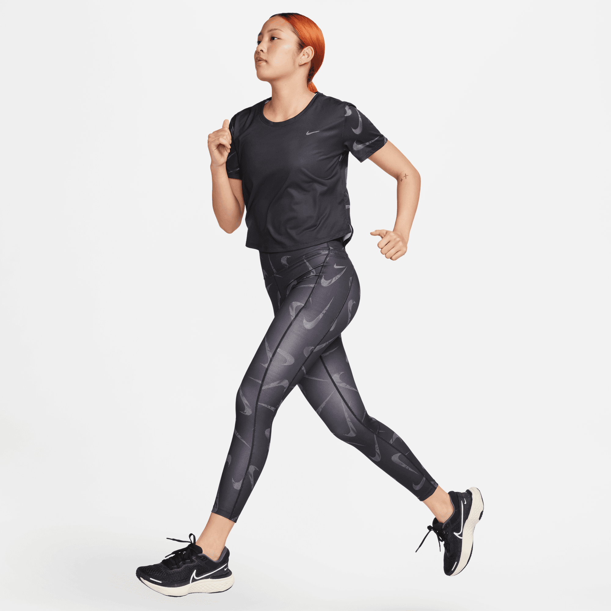 NIKE FAST SWOOSH WOMEN S MID RISE 7 8 PRINTED RUNNING LEGGINGS WITH POCKETS