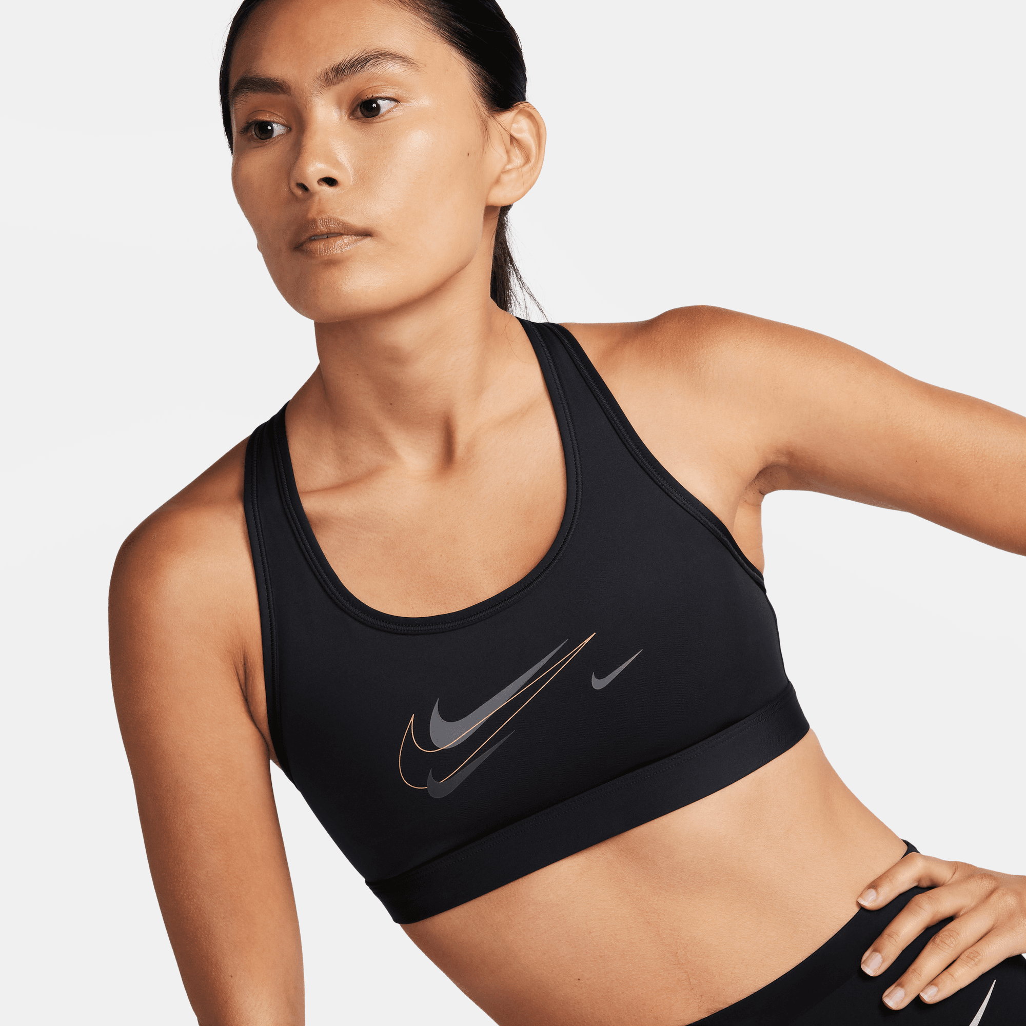 Nike black and gold 2025 sports bra