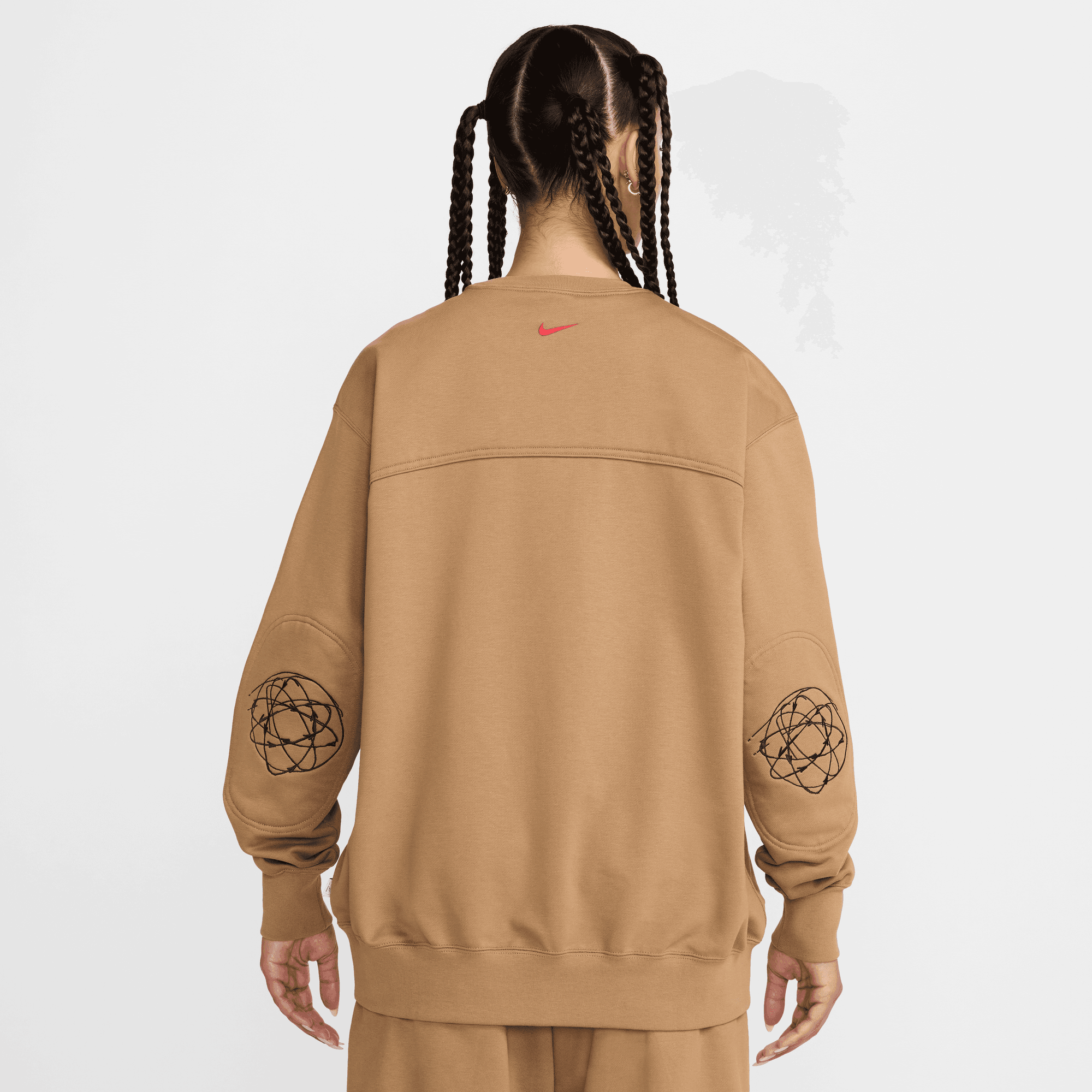 NIKE SPORTSWEAR BREAKING WOMEN'S LOOSE FRENCH TERRY TOP