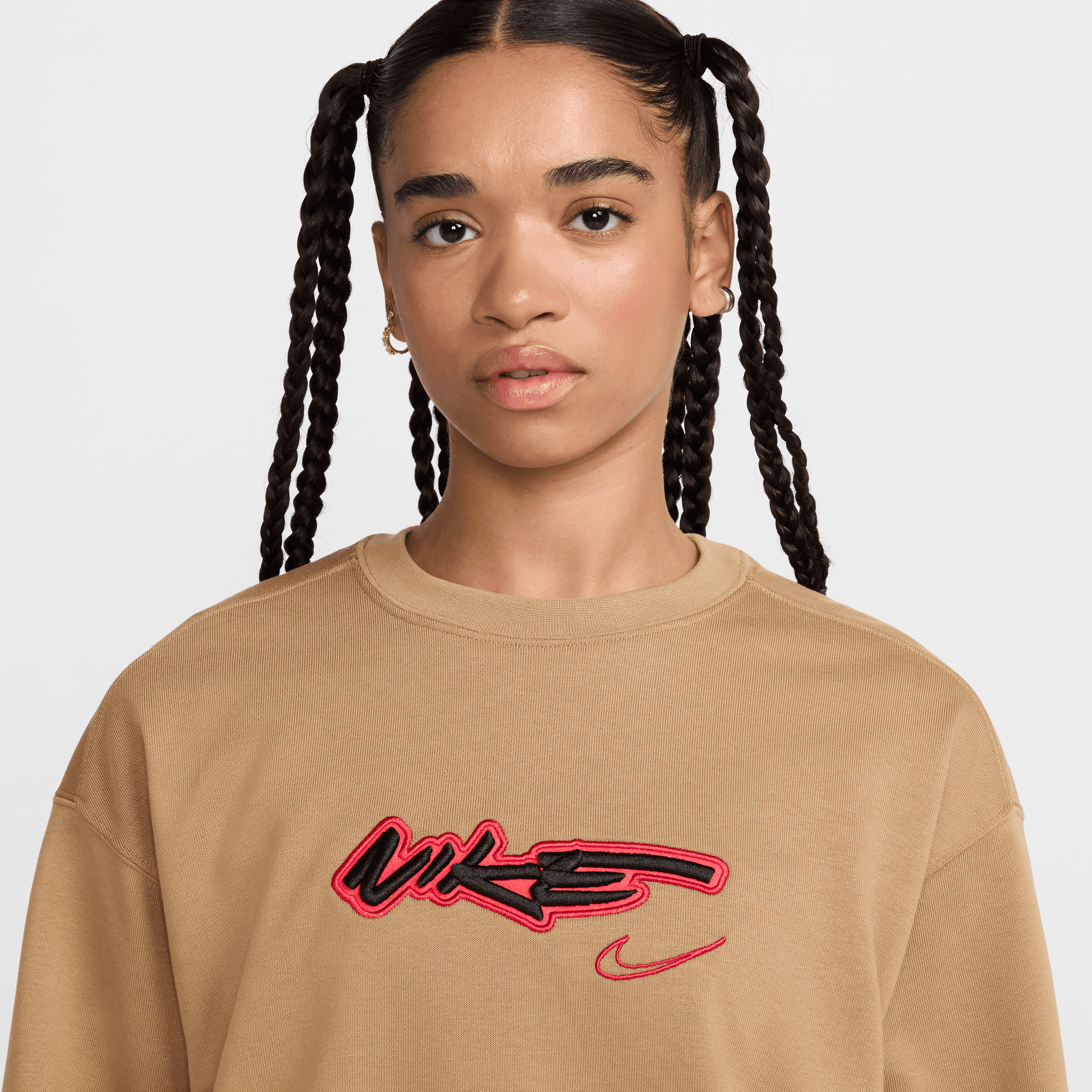 NIKE SPORTSWEAR BREAKING WOMEN'S LOOSE FRENCH TERRY TOP