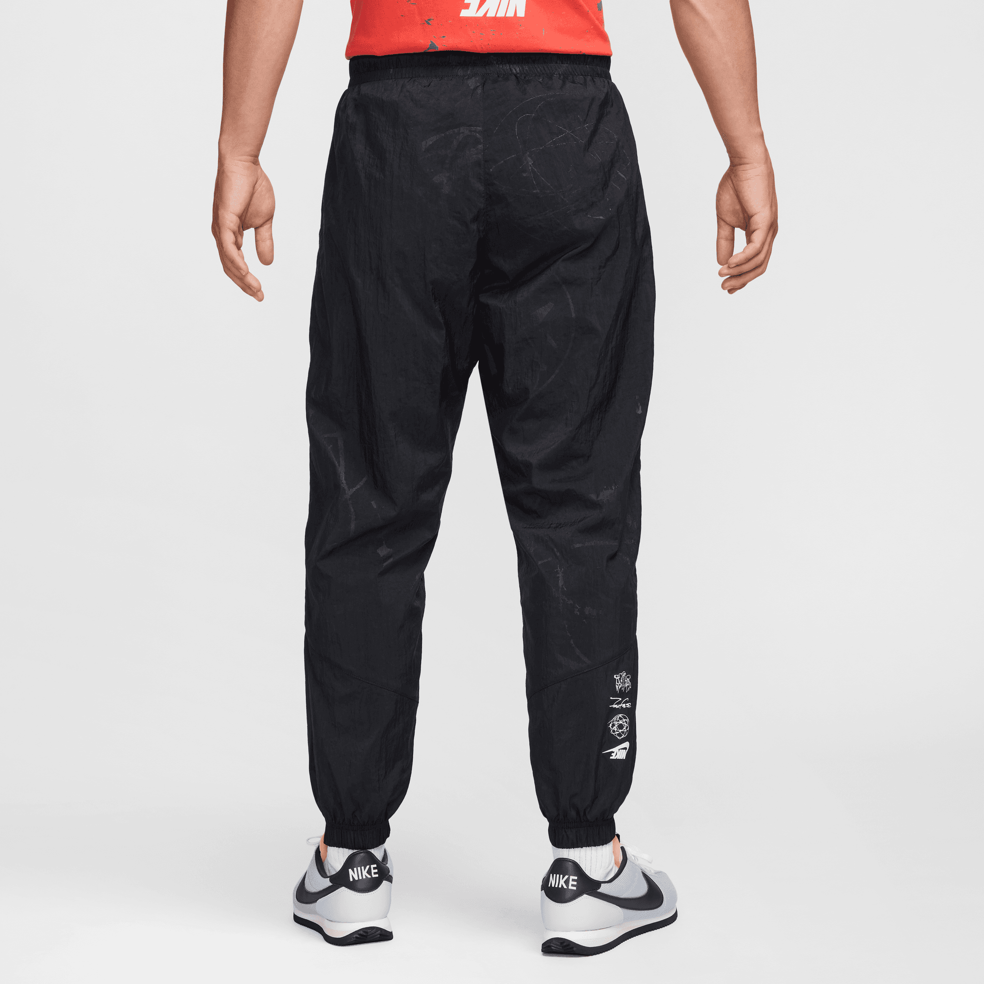 AS MEN S NIKE SPORTSWEAR BREAKING LND WIND RUNNER PANTS