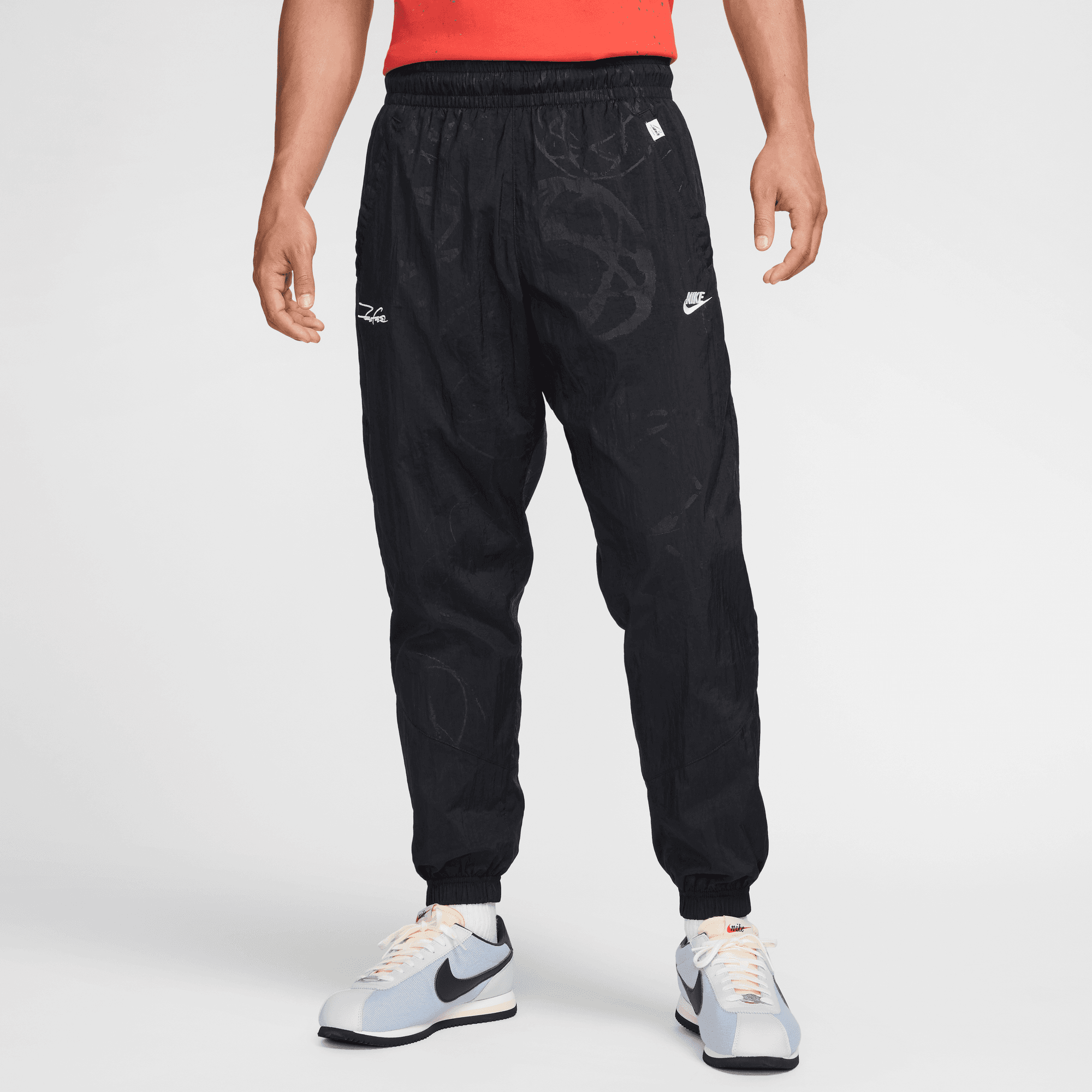 AS MEN'S NIKE SPORTSWEAR BREAKING LND WIND RUNNER PANTS