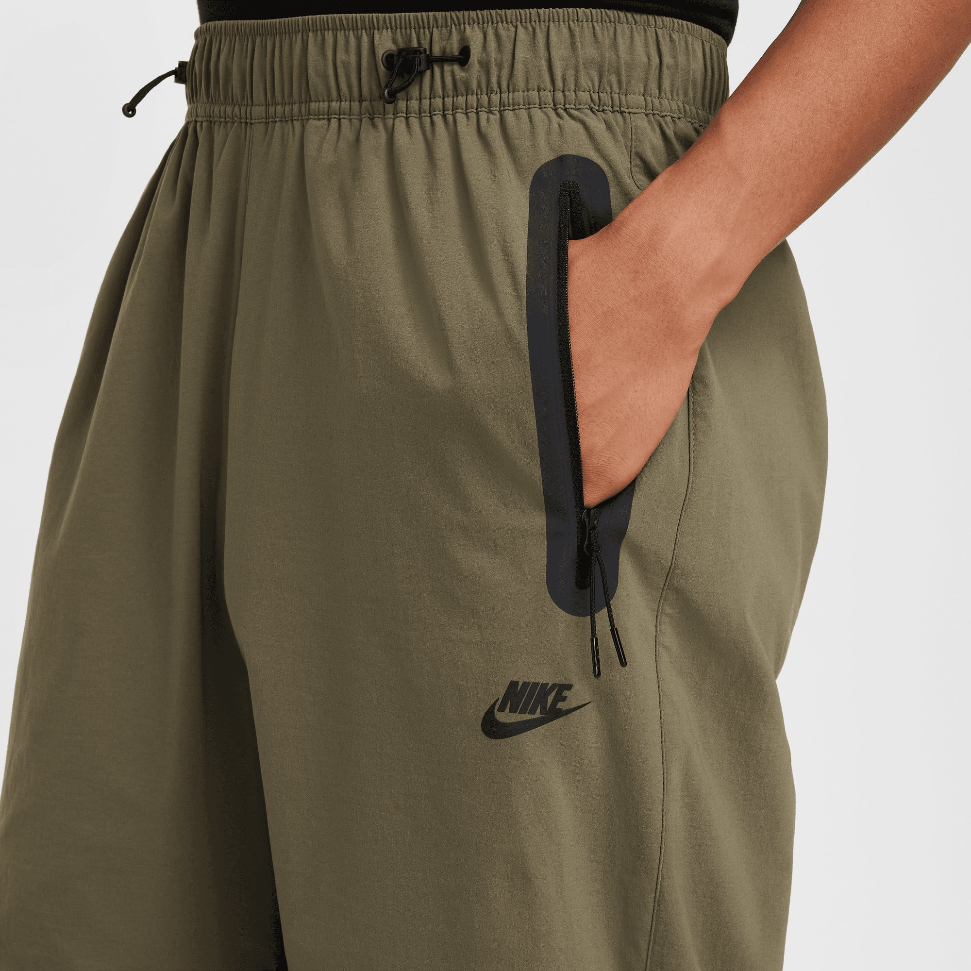 NIKE TECH MEN S WOVEN OPEN HEM PANTS MEDIUM OLIVE MEDIUM OLIVE BLACK Park Access