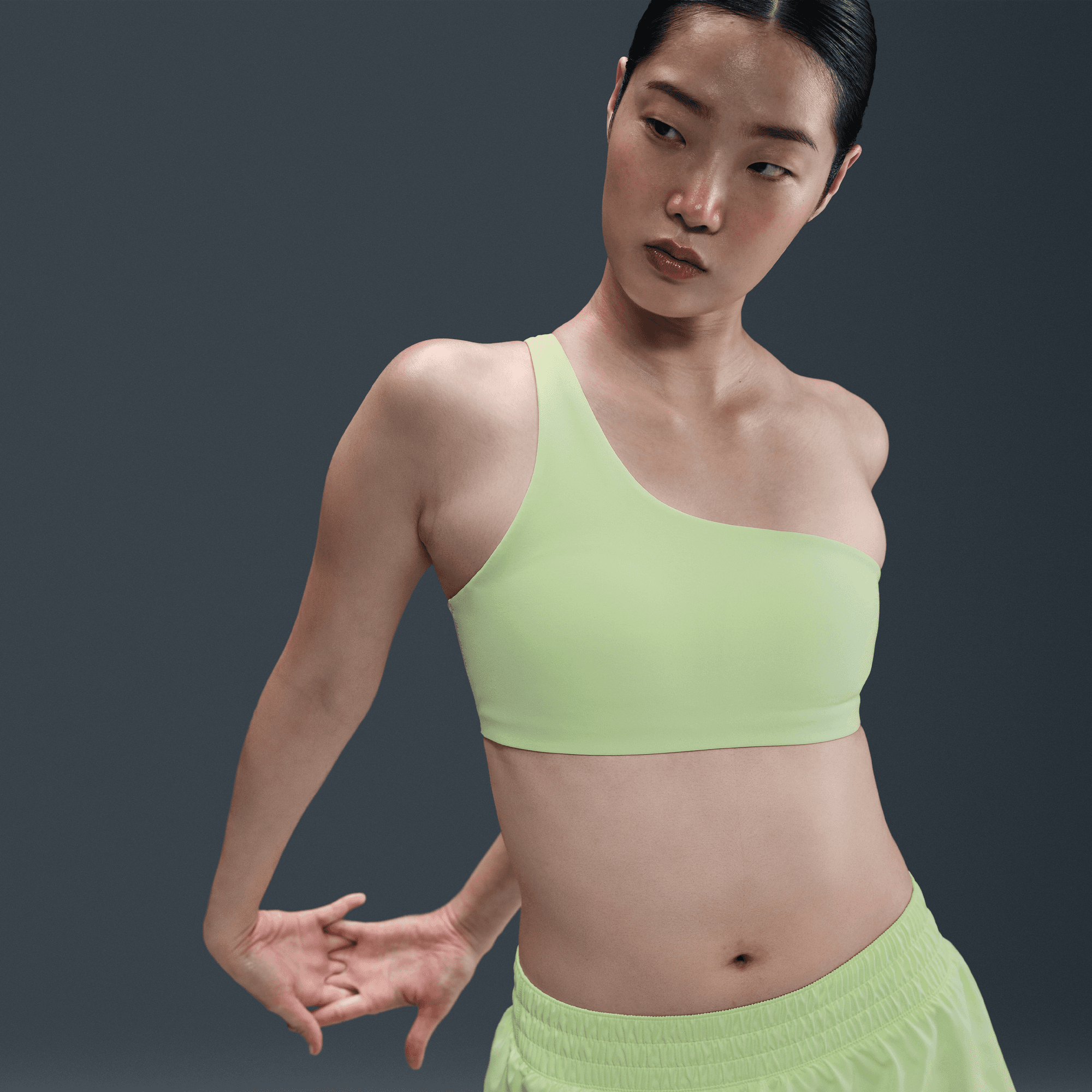 NIKE ZENVY ASYMMETRICAL WOMEN'S LIGHT-SUPPORT PADDED SPORTS BRA