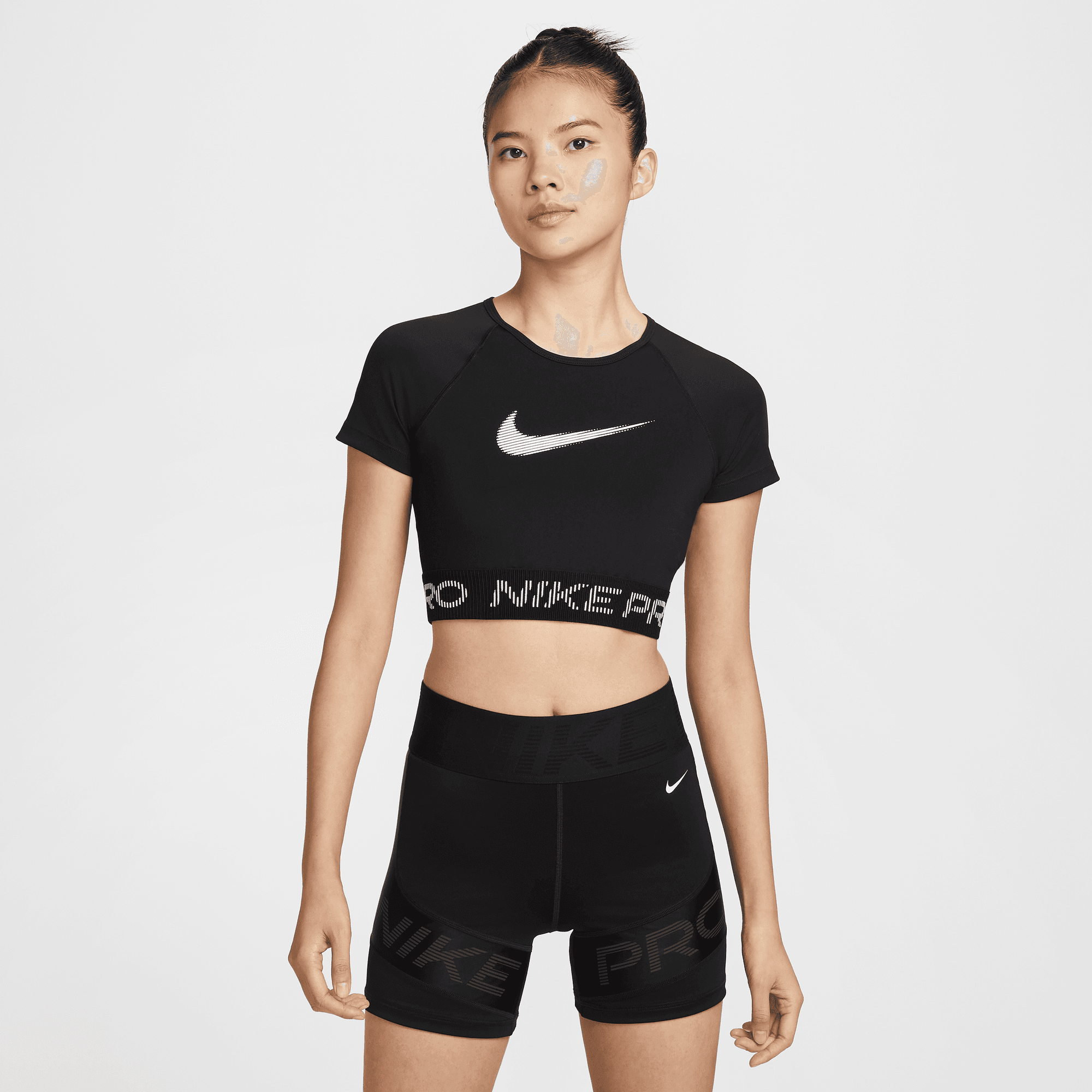 NIKE PRO WOMEN'S DRI-FIT SHORT-SLEEVE CROPPED GRAPHIC TOP