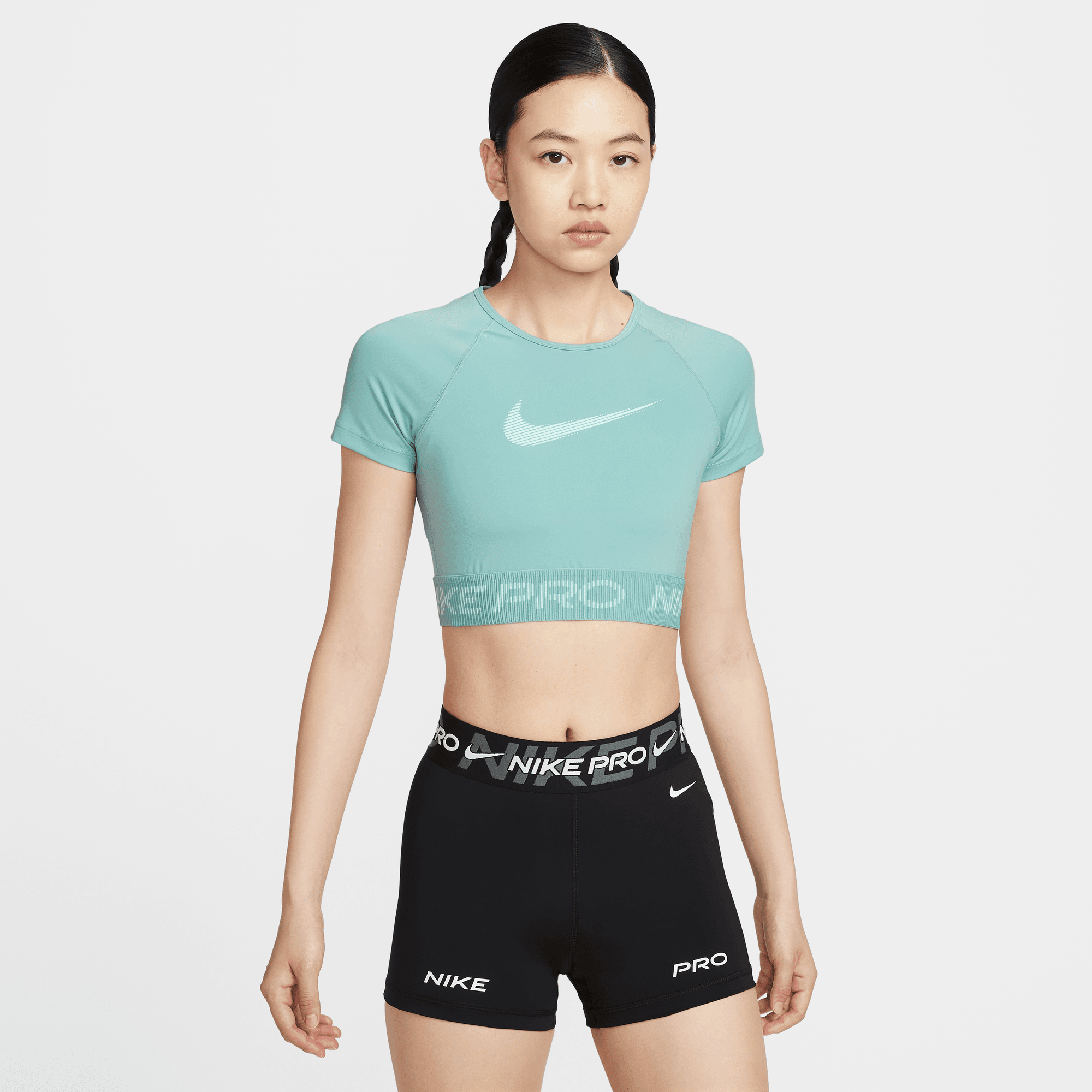 NIKE PRO WOMEN'S DRI-FIT SHORT-SLEEVE CROPPED GRAPHIC TOP