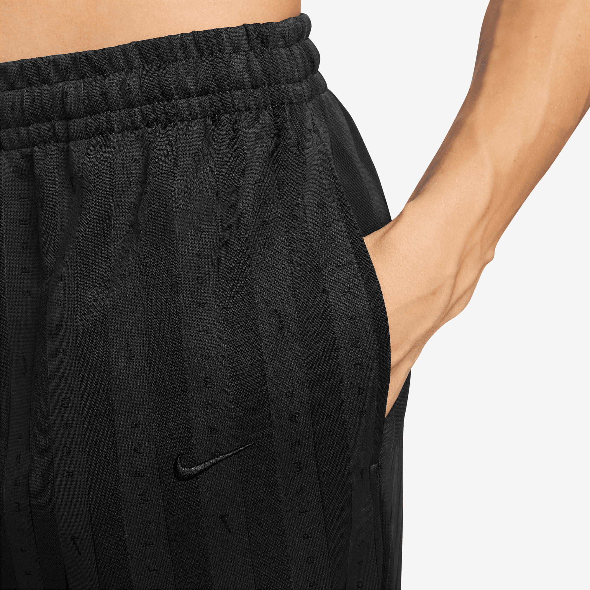 NIKE SPORTSWEAR WOMEN'S MID-RISE LOOSE JACQUARD STRIPED TRACK PANTS