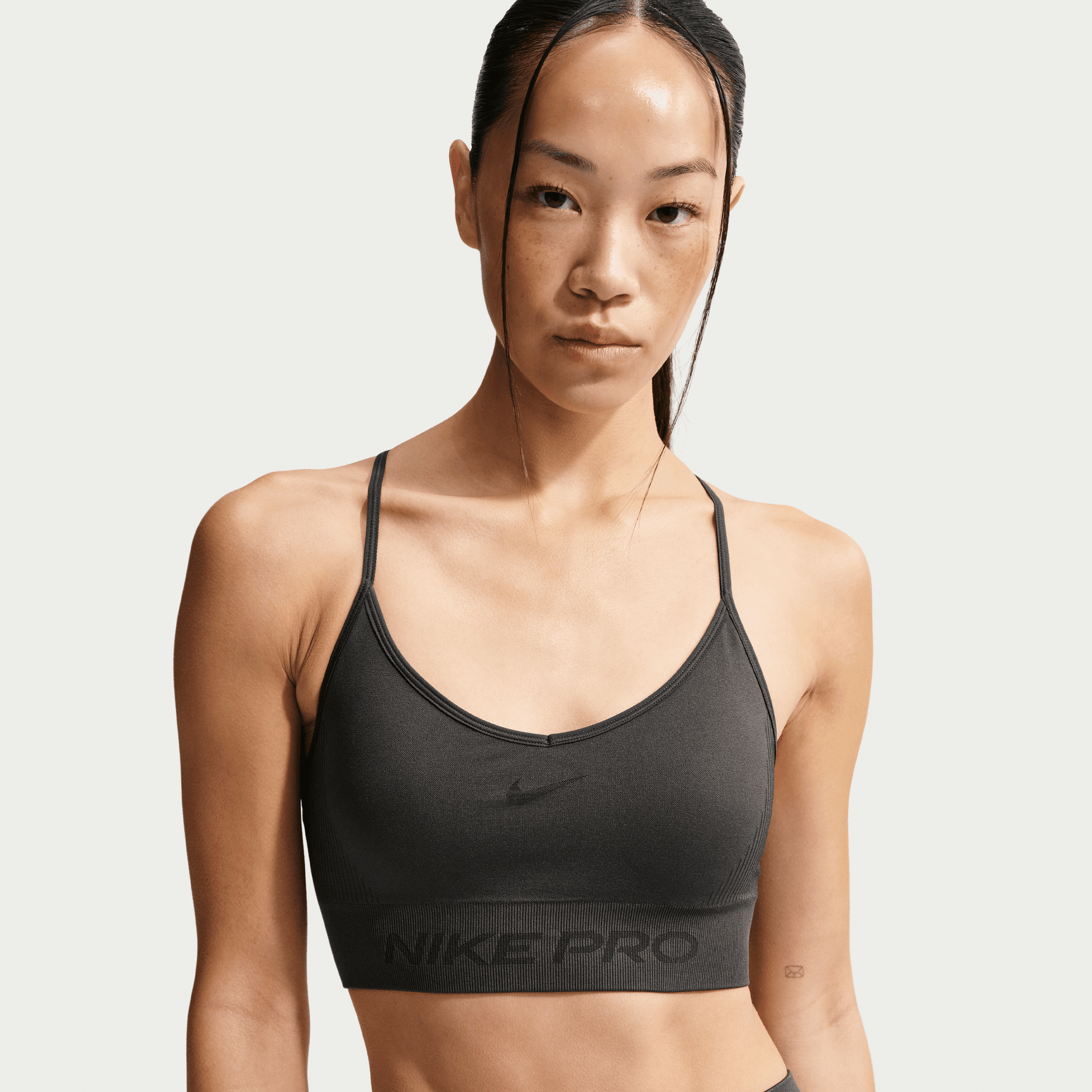 NIKE PRO SEAMLESS WOMEN'S LIGHT-SUPPORT PADDED SPORTS BRA