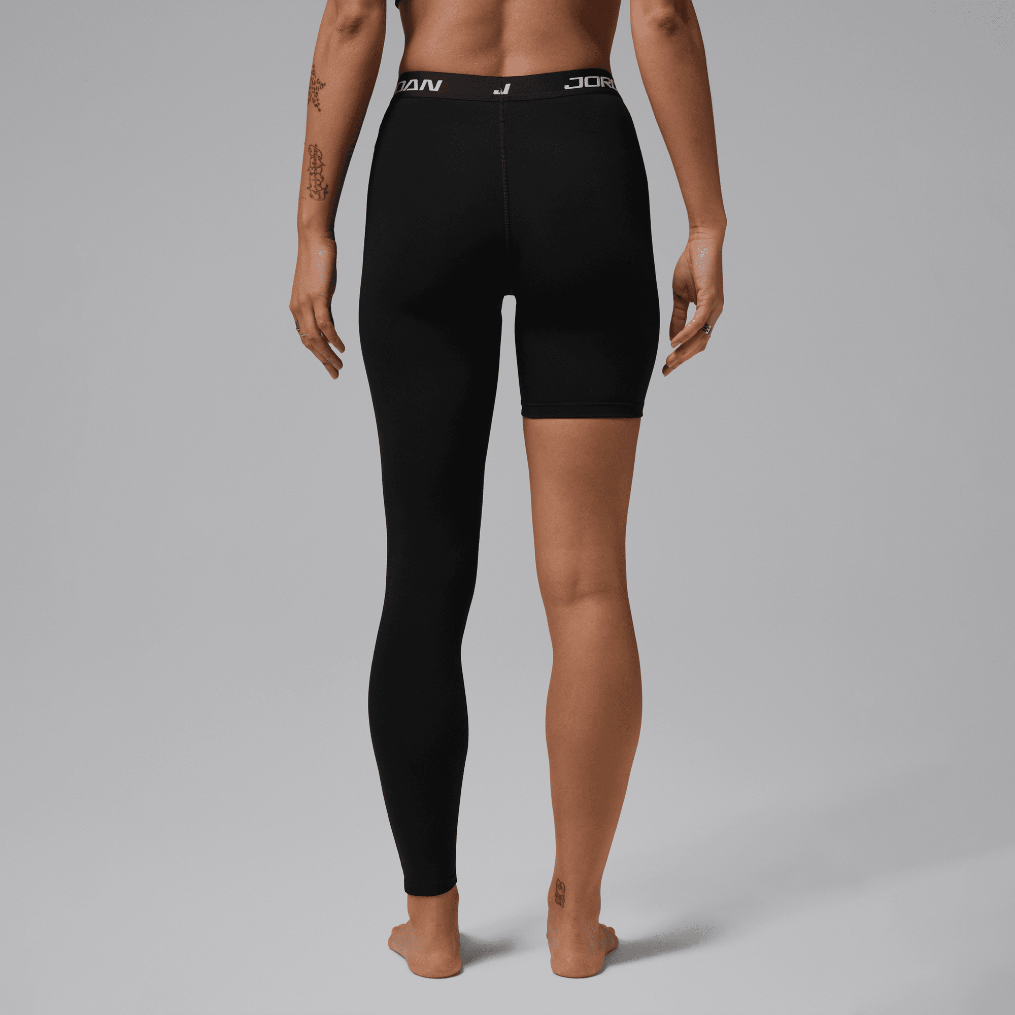 JORDAN SPORT WOMEN'S HIGH-RISE SINGLE-LEG BASKETBALL TIGHTS (LEFT)