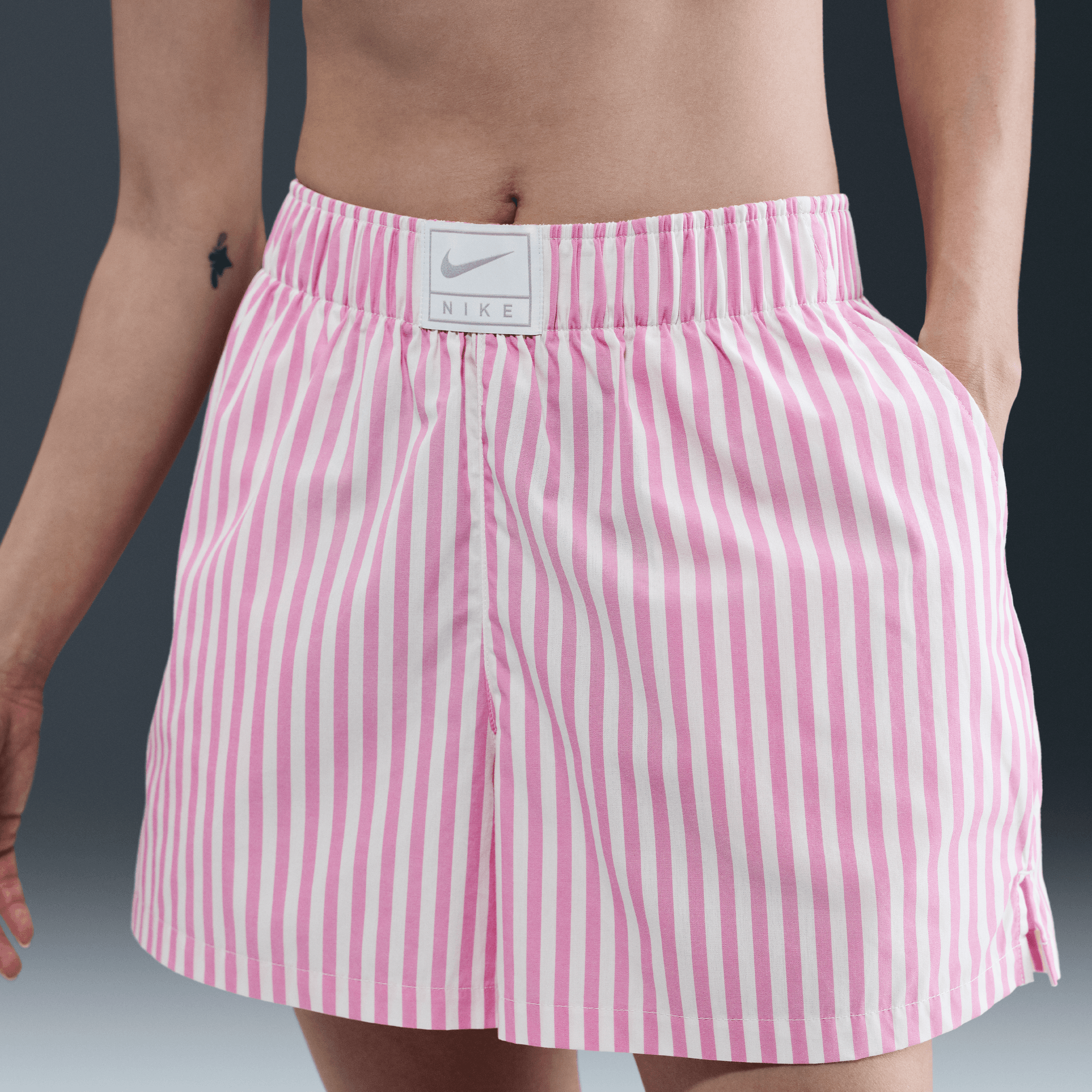 NIKE SPORTSWEAR CHILL POPLIN WOMEN'S MID-RISE LOOSE STRIPED SHORTS